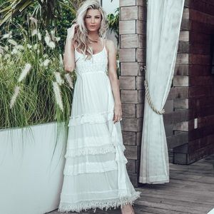 White embroidered linen dress.